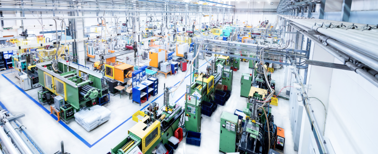 A vibrant factory scene featuring a variety of machines.